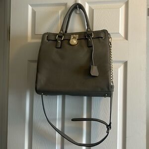 gray tot purse with matching wrist bag
